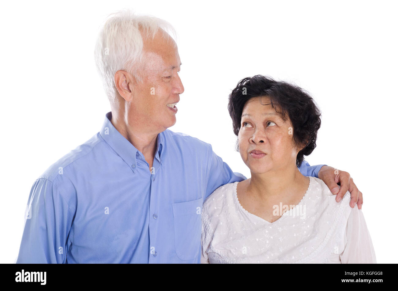 Happy Asian elderly couple smiling, standing isolated on white ...