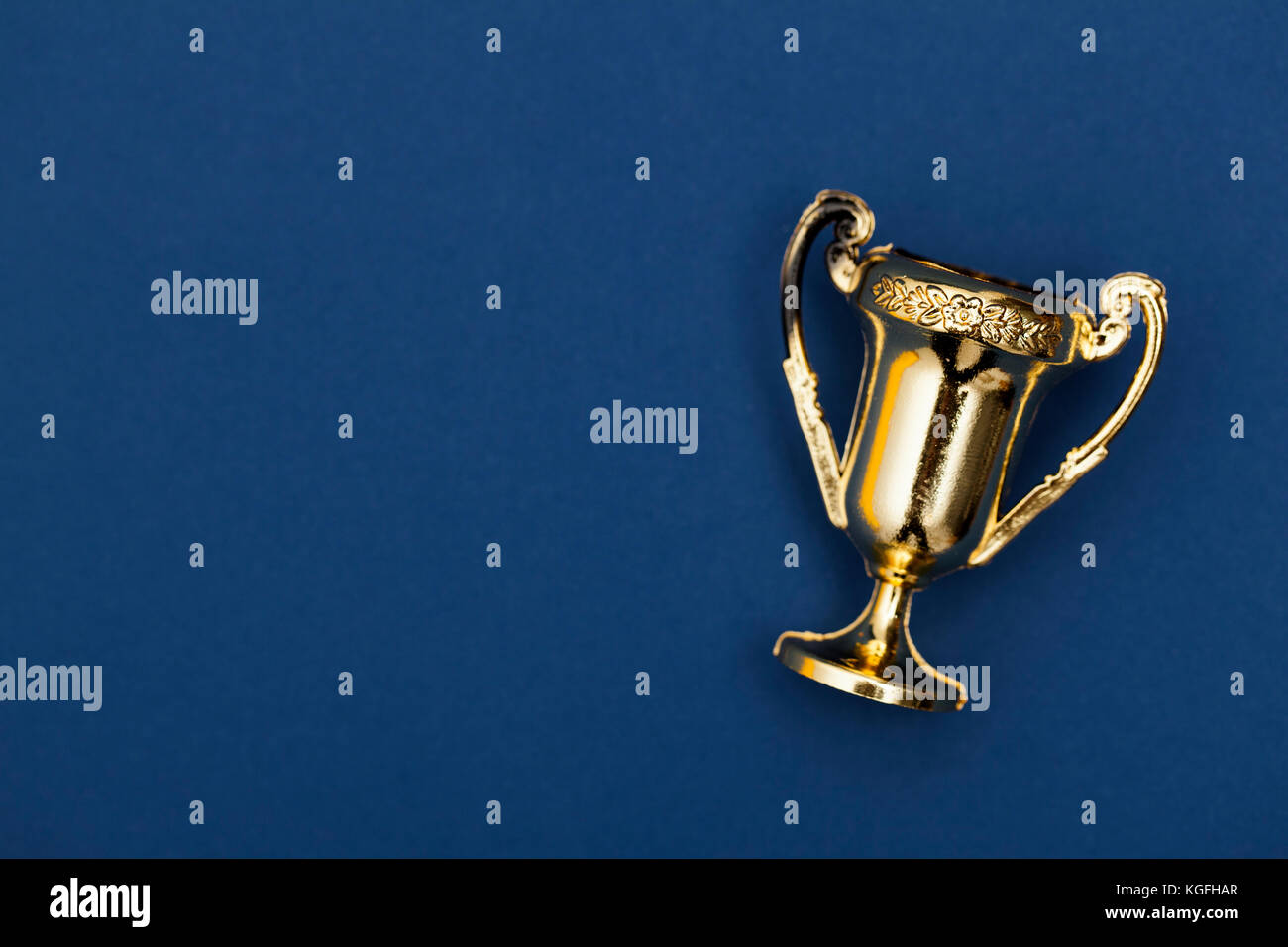 Gold winners achievement trophy background Stock Photo