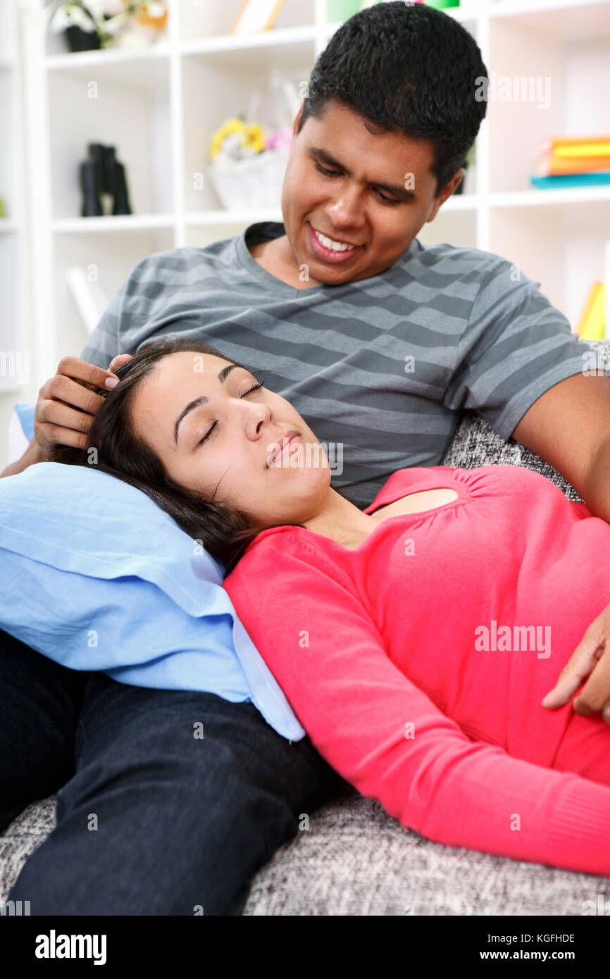 young couple relaxing time, girl sleeping on his lap Stock Photo Alamy