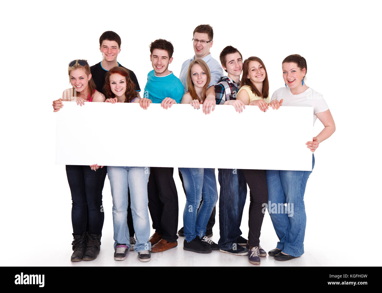 Group of young friends holding banner, isolated on white background Stock  Photo - Alamy