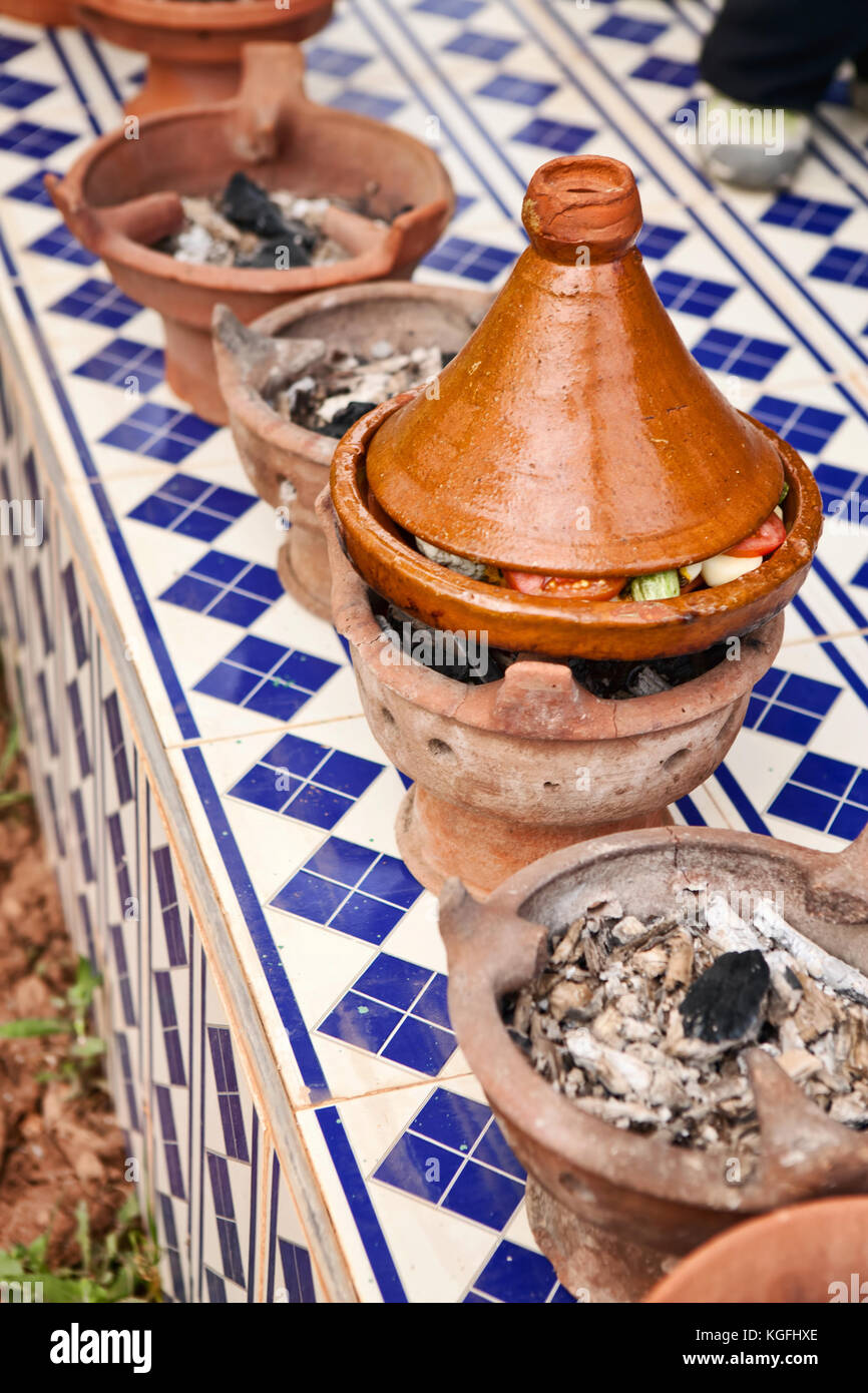Moroccan handmade ceramic Tajine, preparing food Stock Photo