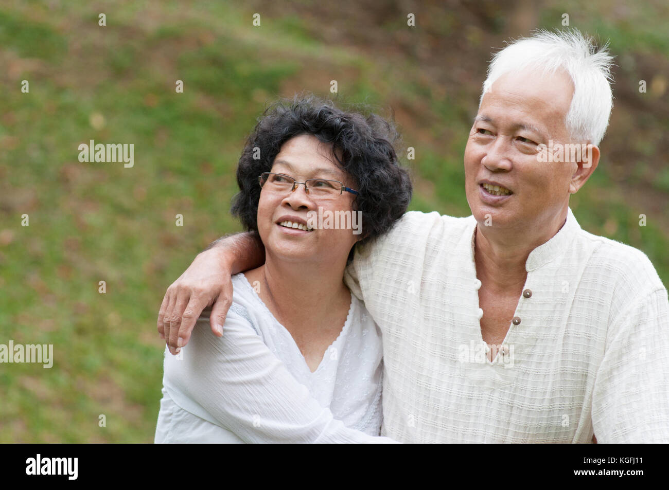 Beautiful happy Asian old people sitting in the summer park Stock Photo ...