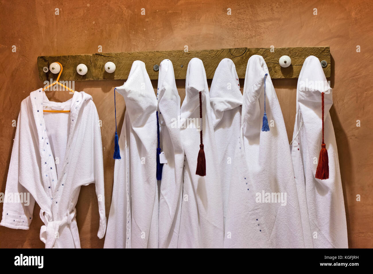 traditional Arabic bathrobes hanging in a locker room Stock Photo Alamy