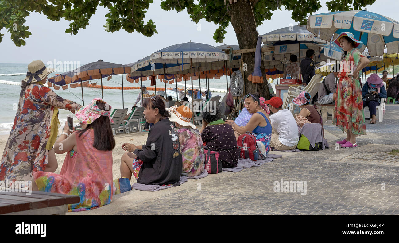Chinese tourists group. Women. Pattaya Beach road Thailand, Southeast Asia. Stock Photo