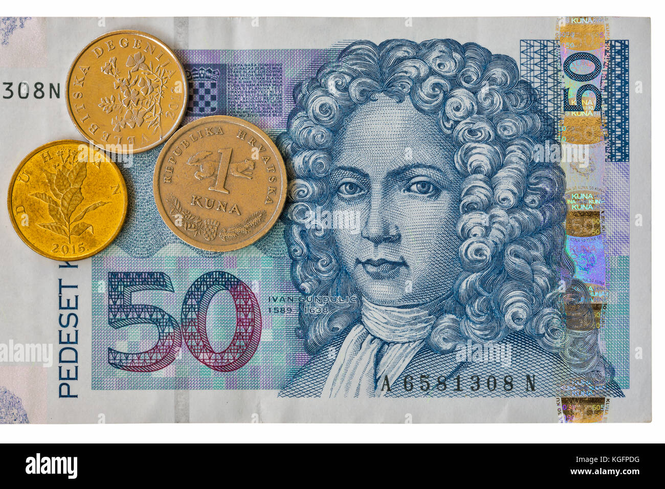 Croatian currency notes 50 Kuna banknote with coins macro isolated on white, front side. Ivan Gundulic portrait. Stock Photo