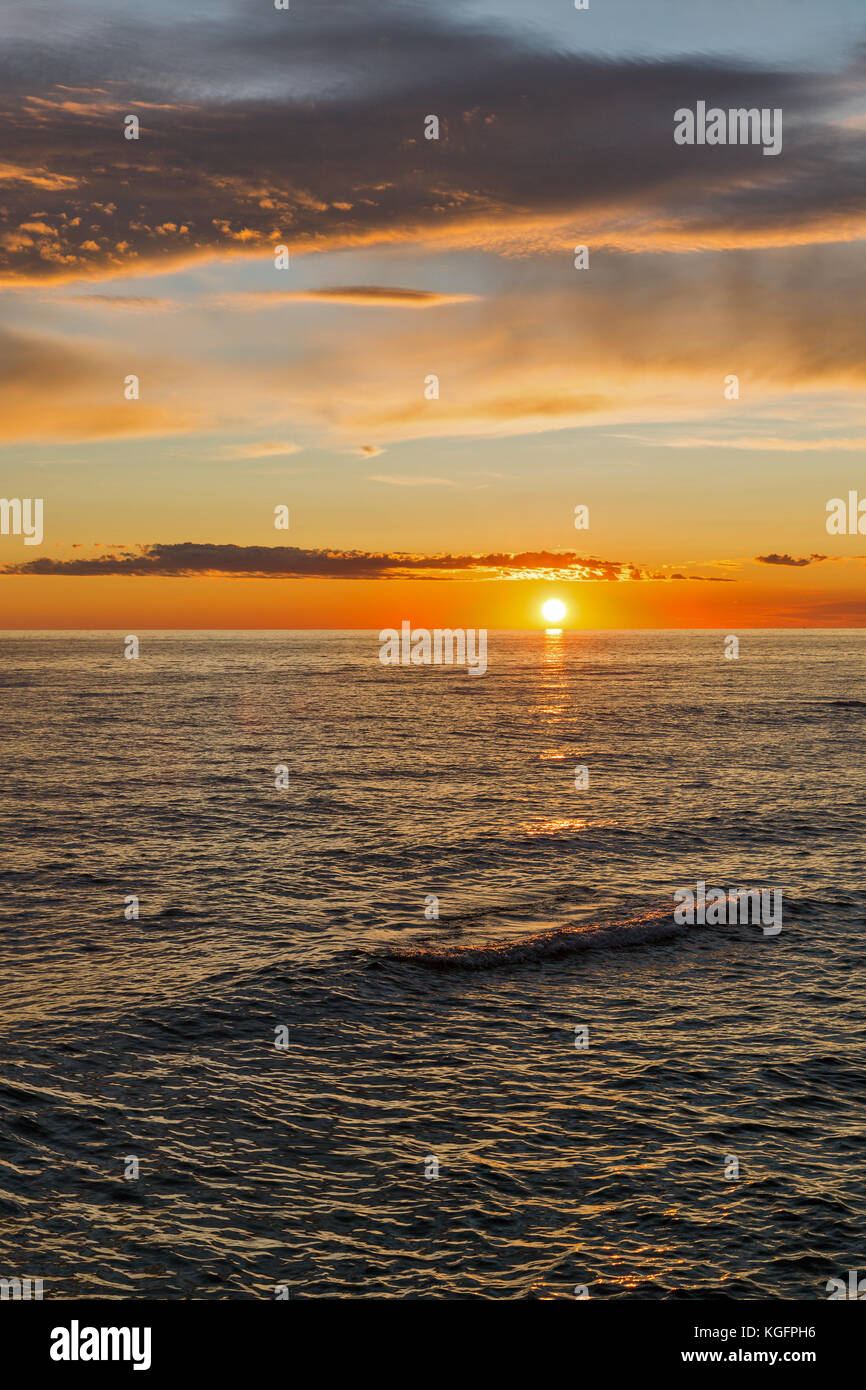 Dramatic sunset with stormy sea on the coast of Adriatic Sea, Istria, Croatia Stock Photo