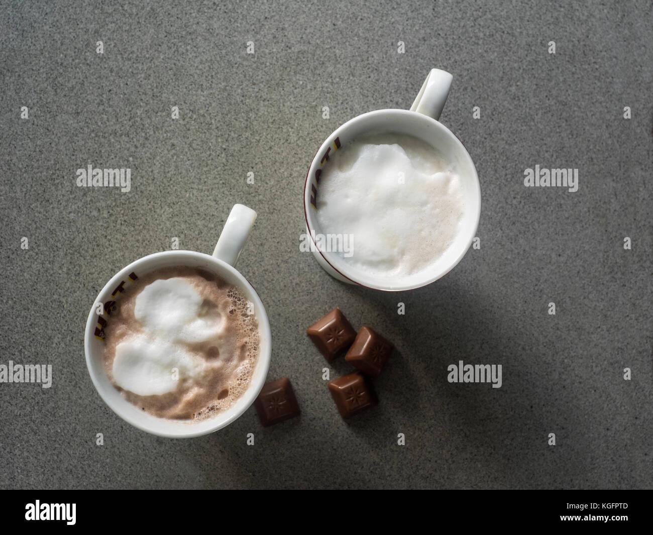 https://c8.alamy.com/comp/KGFPTD/high-angle-view-of-hot-chocolat-on-grey-table-KGFPTD.jpg