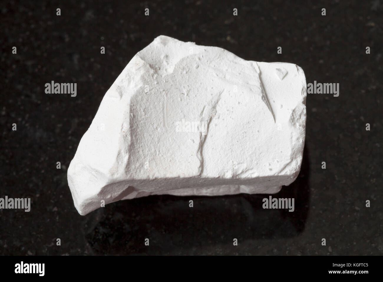 macro shooting of natural mineral rock specimen raw chalk stone on