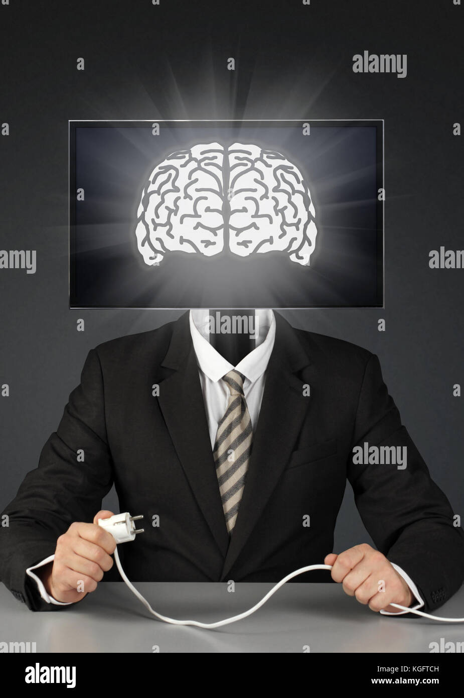 businessman with tv head, mass media addiction concept Stock Photo