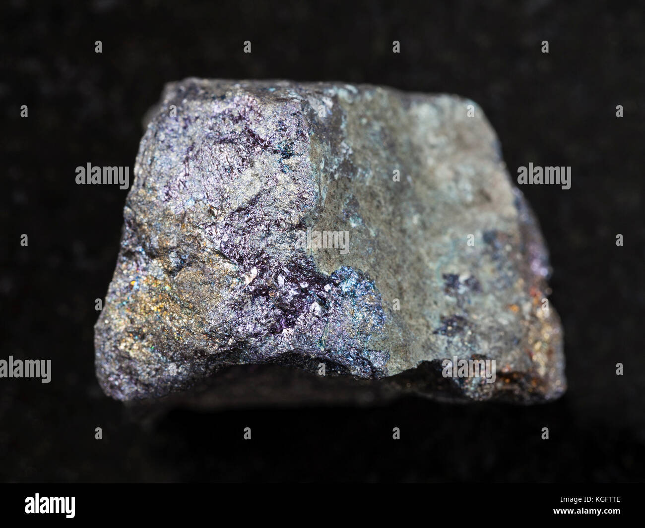 macro shooting of natural mineral rock specimen - raw bornite stone on