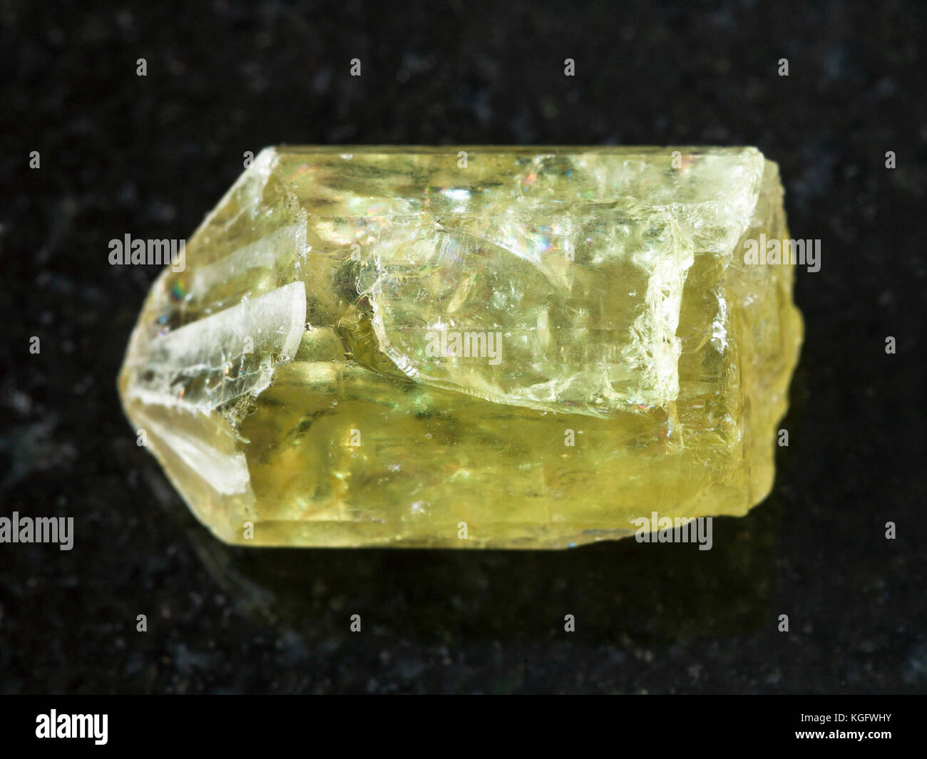 Macro Shooting Of Natural Mineral Rock Specimen Raw Crystal Of Yellow Apatite Gemstone On Dark Granite Background From Mexico Stock Photo Alamy