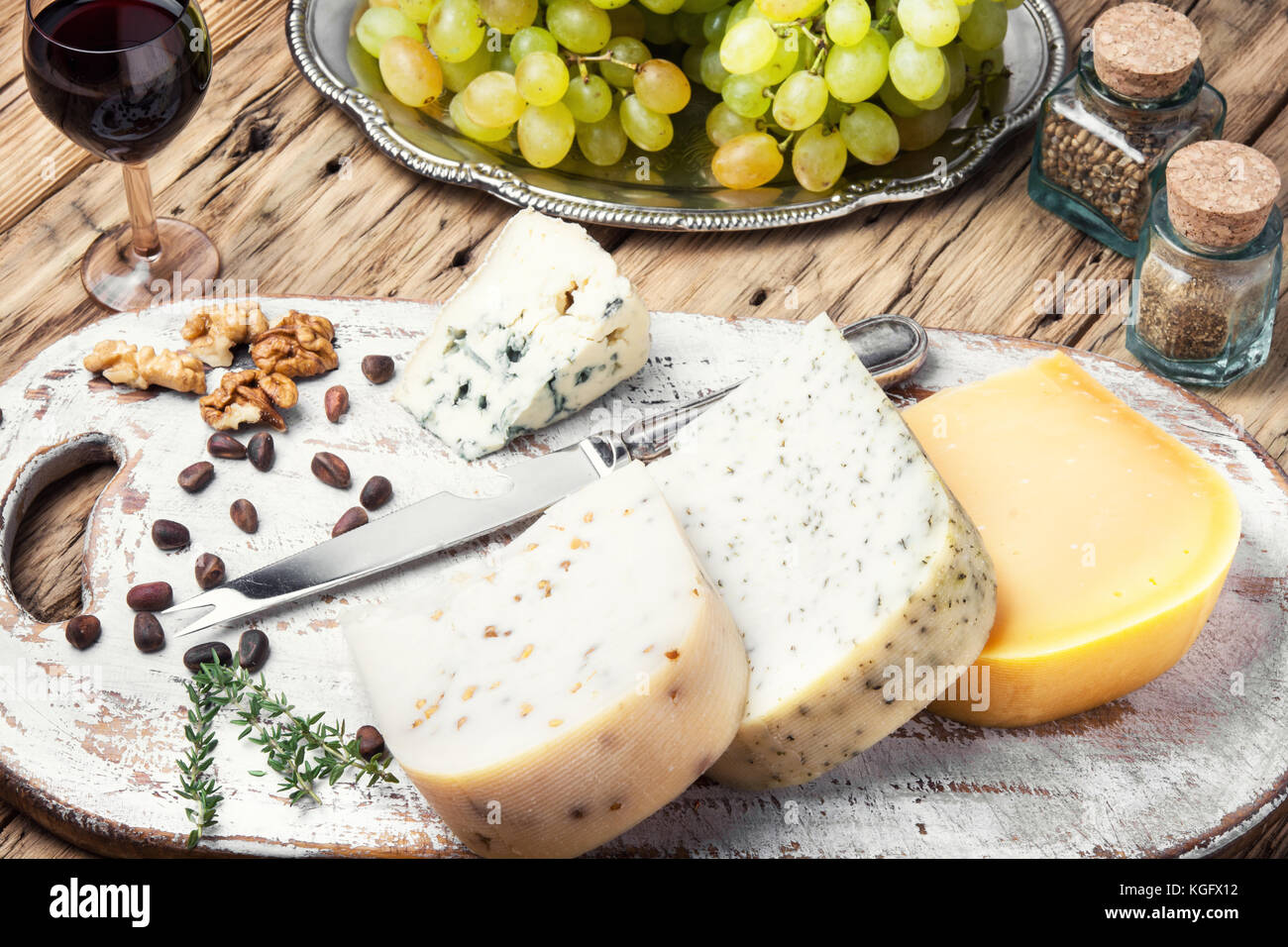 aromatic Swiss cheese and a glass of grape wine Stock Photo Alamy