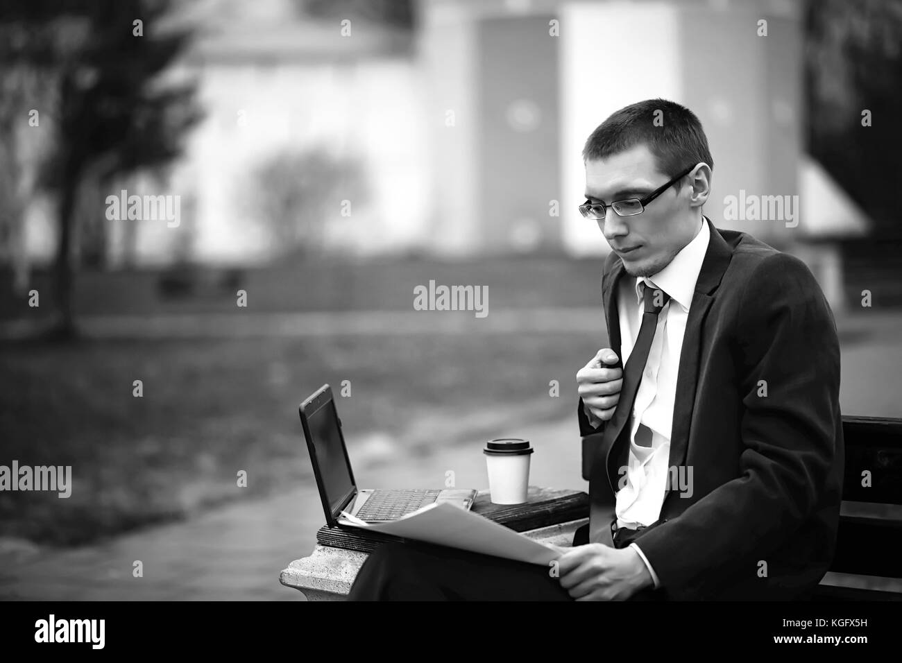 Businessman in a suit on the street Stock Photo - Alamy