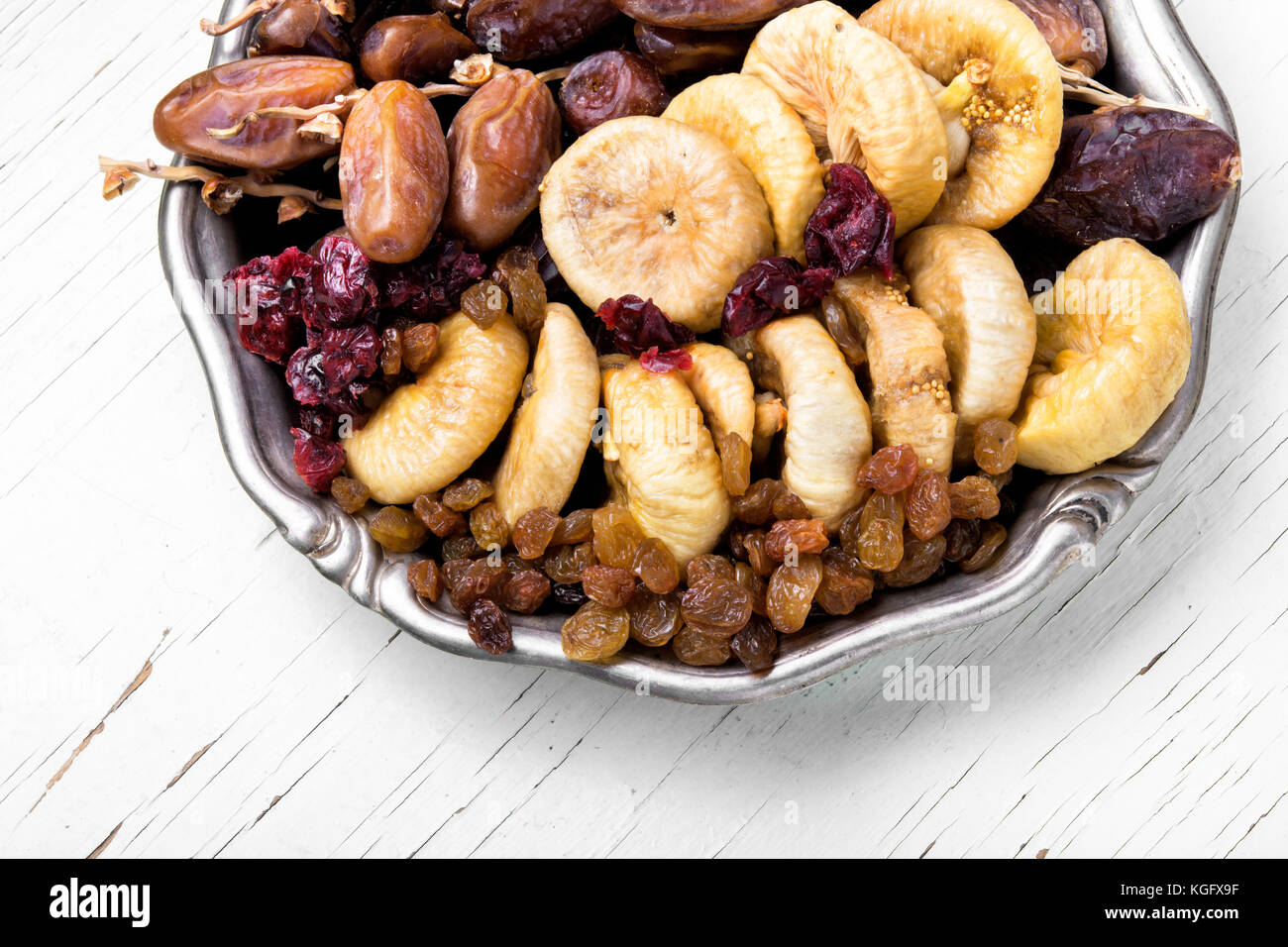 Dish with oriental sweets dates and figs stock photo alamy