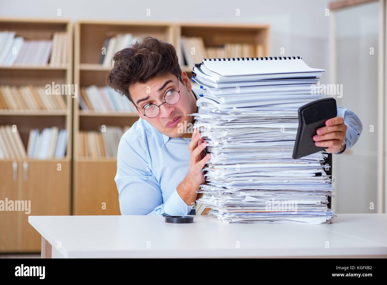 Funny accountant bookkeeper working in the office Stock Photo - Alamy