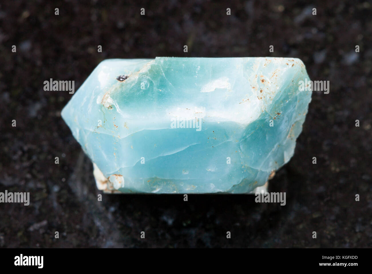 macro shooting of natural mineral rock specimen - rough crystal of blue ...