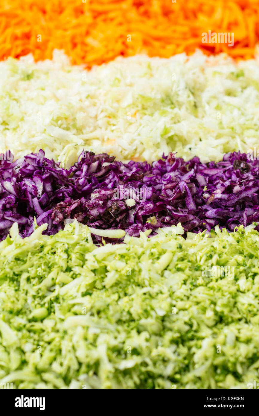Shredded green and purple cabbage, broccoli, carrots Stock Photo Alamy