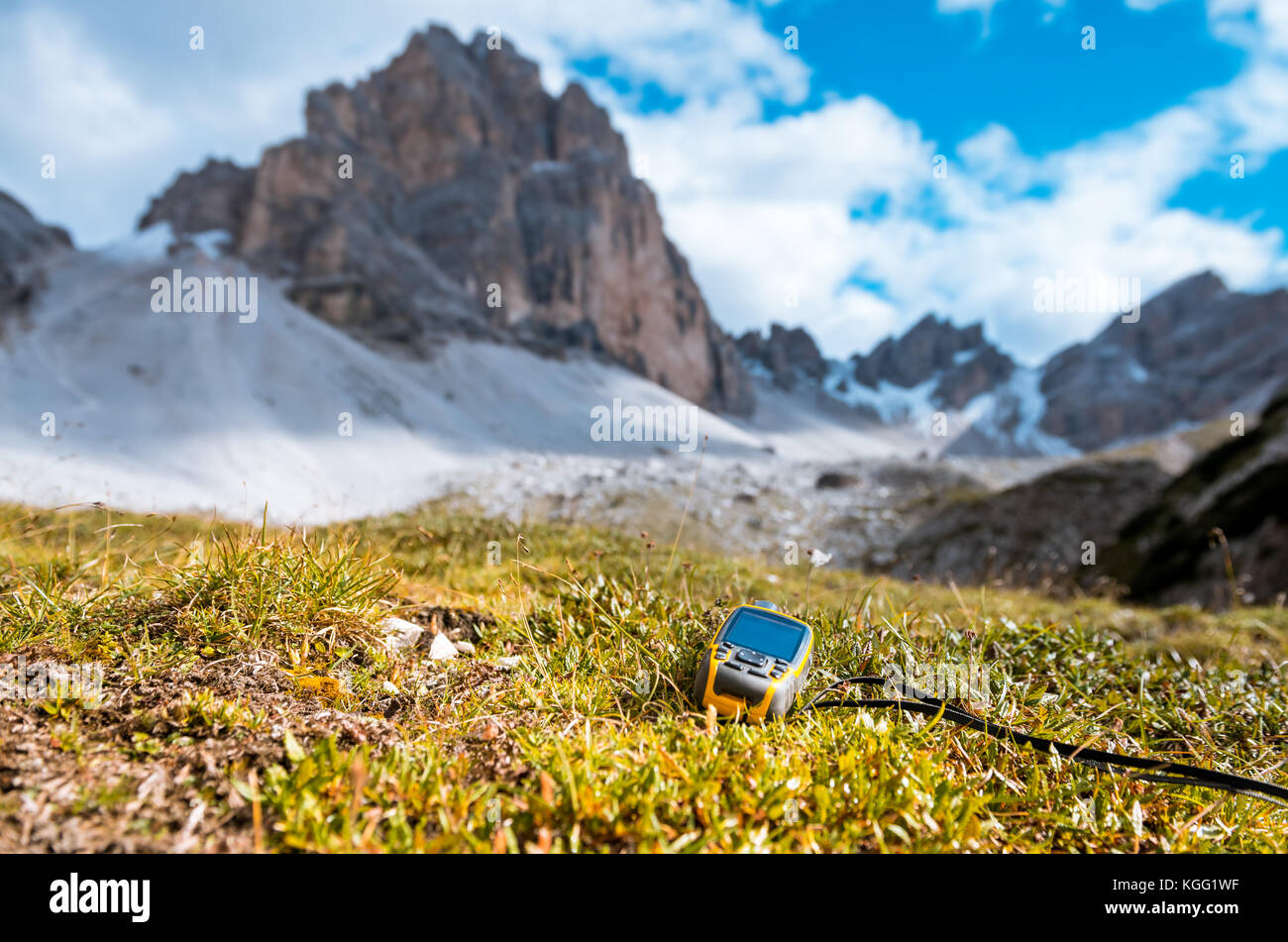 GPS navigator in hand Dolomites Alps Stock Photo