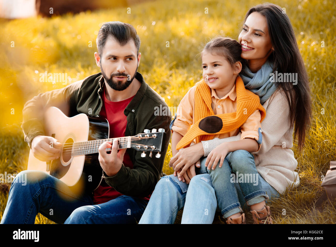 Family in park Stock Photo - Alamy