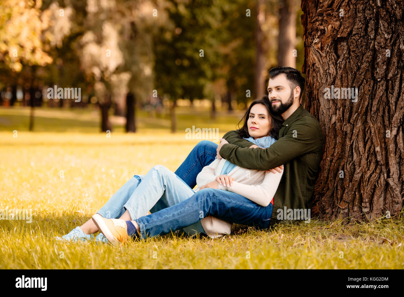 couple hugging in park Stock Photo - Alamy