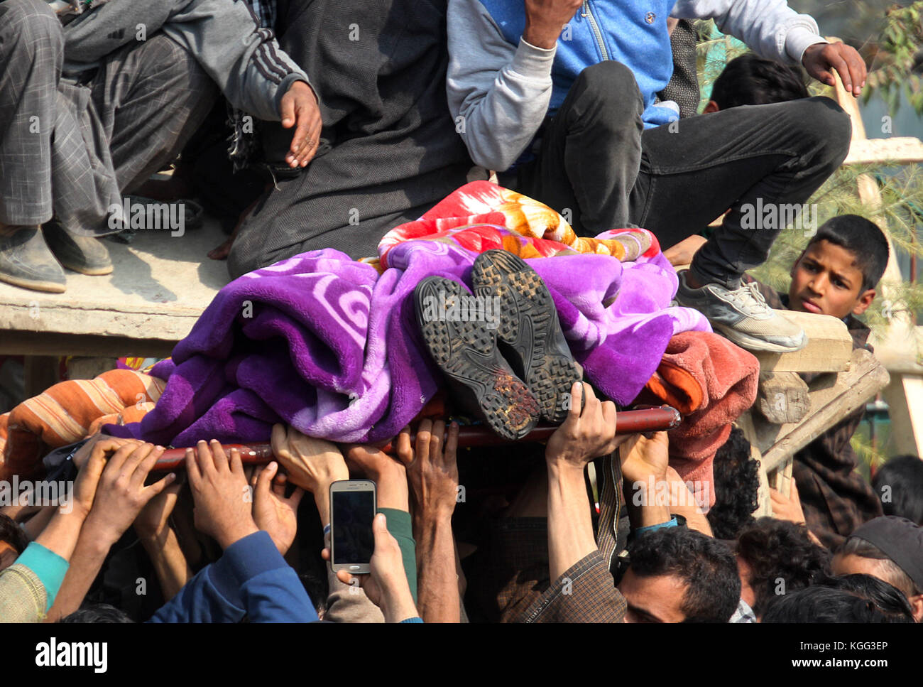 Pulwama, India. 07th Nov, 2017. (EDITORS NOTE: Image depicts death) Kashmiri villagers carry the dead body of Waseem Ahmad a local militant during his funeral in Drabgam, Pulwama some 45 kilometers from Srinagar the summer capital of Indian controlled Kashmir on November 07, 2017.Three militants and an Indian army soldier were killed in a gun-battle between militants and government forces in Aglar Kandi area of south Kashmir's Pulwama, Police reports. Credit: Faisal Khan/Pacific Press/Alamy Live News Stock Photo