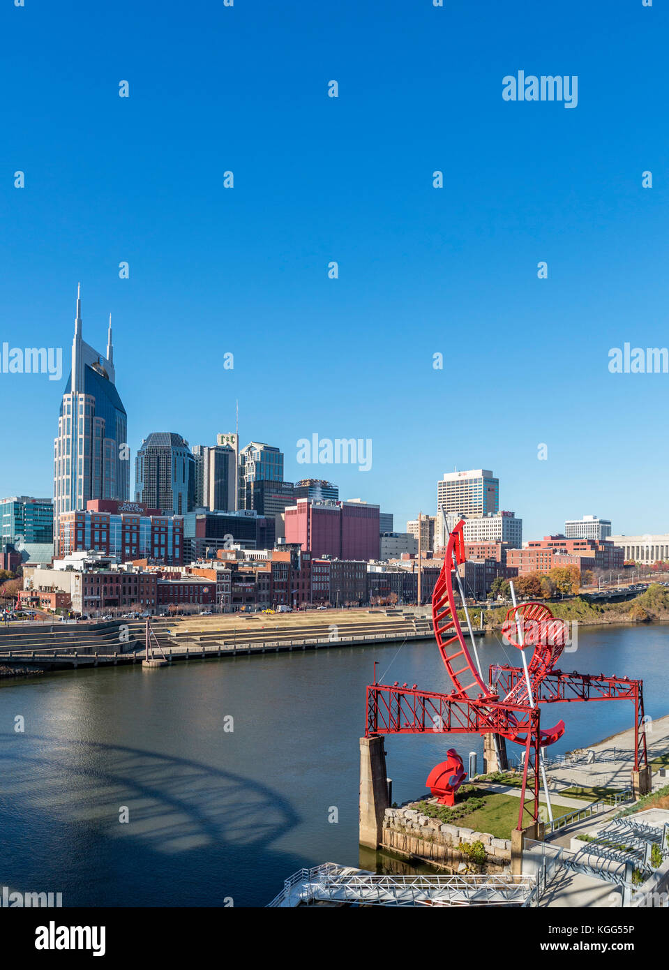 Nashville skyline from Seigenthaler Bridge, Nashville,Tennessee, USA. Alice Aycock's sculpture Ghost Ballet for East Bank Machineworks in foreground. Stock Photo