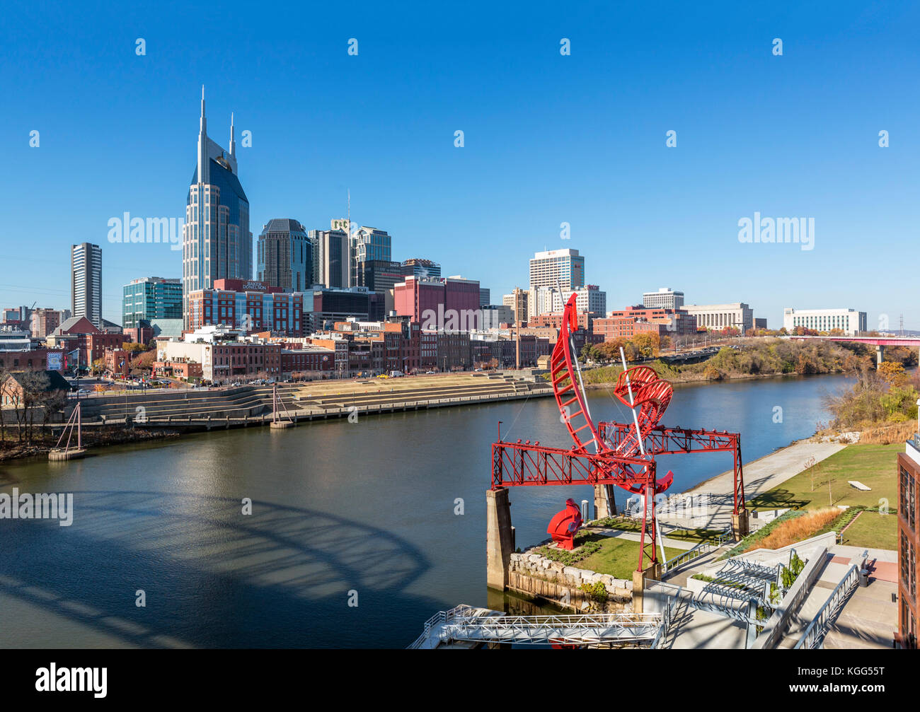 Nashville skyline from Seigenthaler Bridge, Nashville,Tennessee, USA. Alice Aycock's sculpture Ghost Ballet for East Bank Machineworks in foreground. Stock Photo