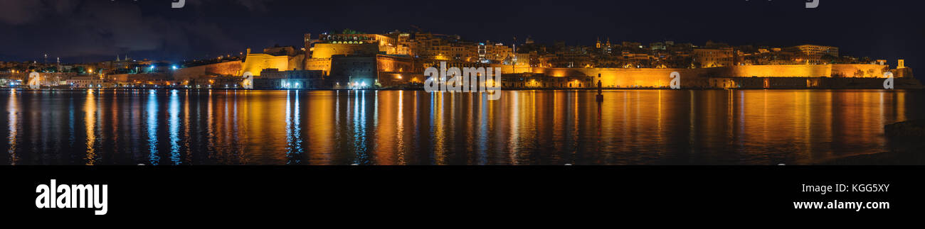 View from Fort Saint Angelo to Valletta at night (Malta) Stock Photo