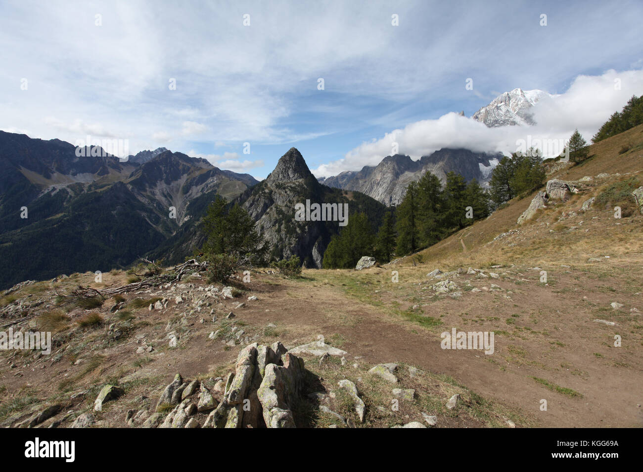 beautiful panoramic view of the alps around the Mont Blanc mountain range in Europe. Tour the Mont Blanc hiking around glaciers, forests and streams Stock Photo