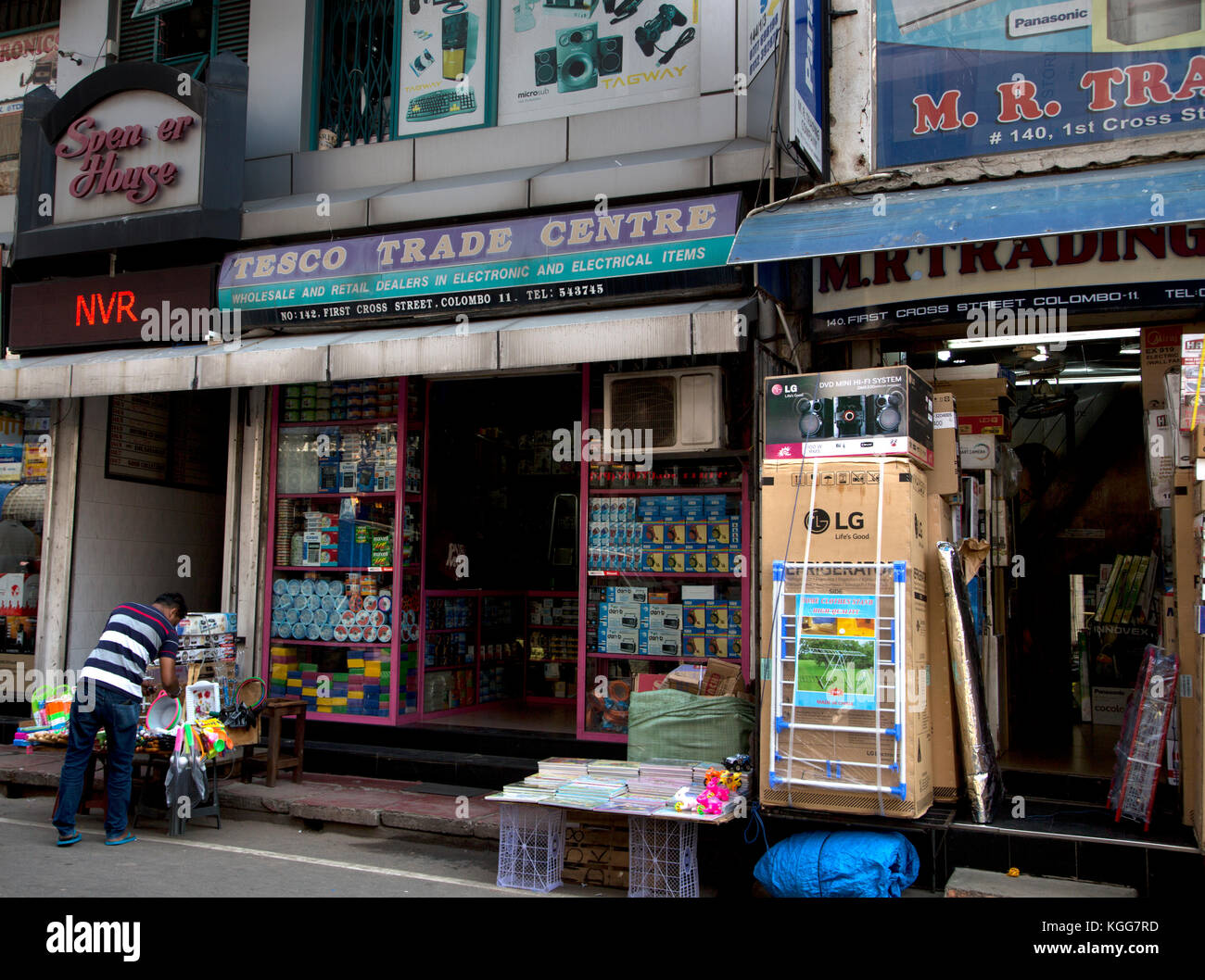 The Pettah Colombo Sri Lanka First Cross Street man at stall outside
