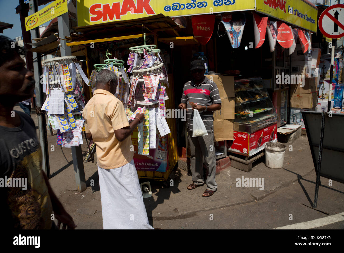 The Pettah Colombo Sri Lanka First Cross Street Man buying Lottery Tickets Stock Photo