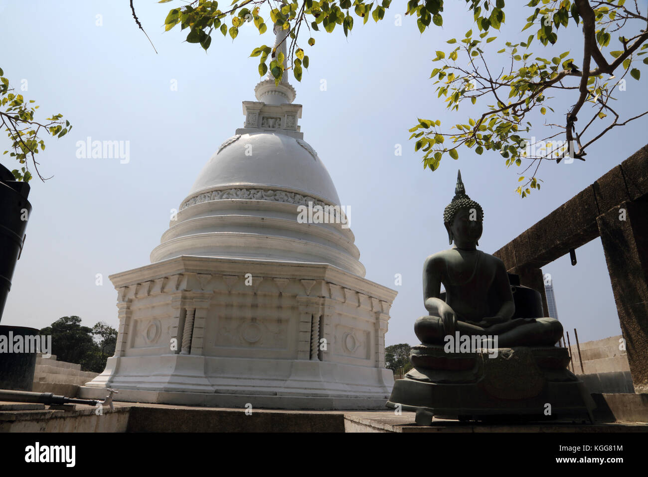 Seema Malaka Temple Colombo Sri Lanka White Stupa and Thai Buddha in Bhumisparsa Mudra Stock Photo