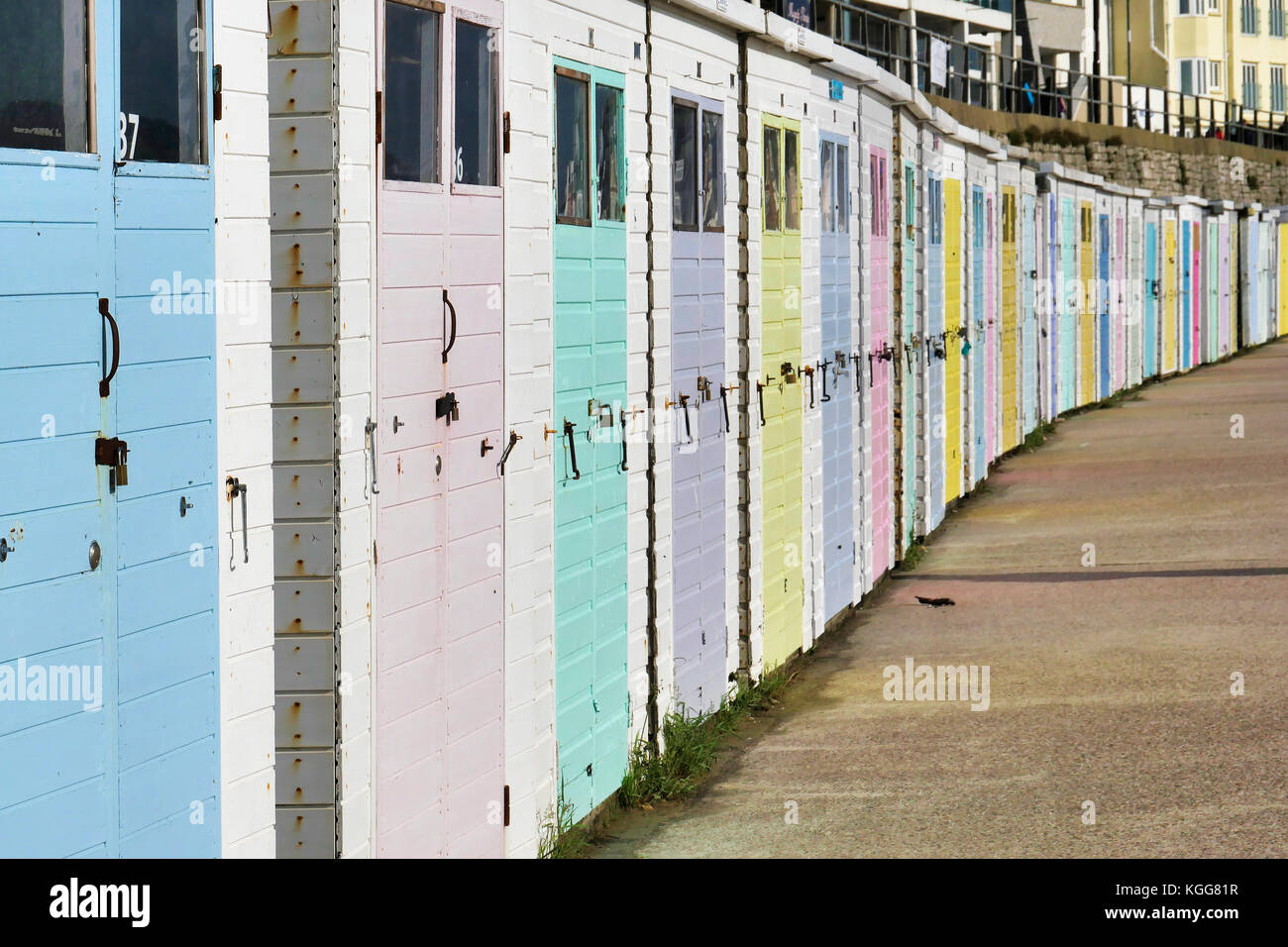 Row of beach huts at Lyme Regis in Dorset. Stock Photo
