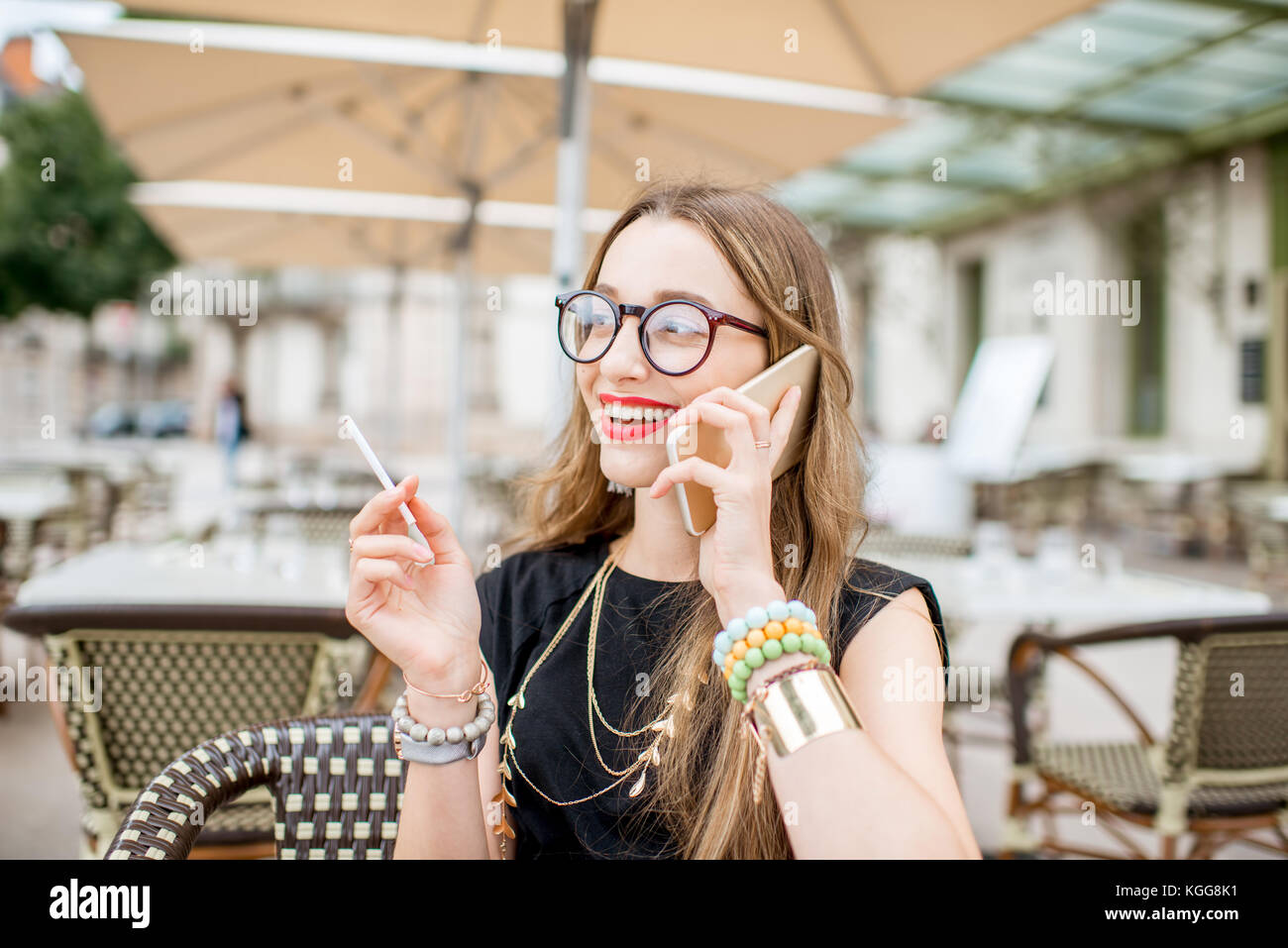 Smoking woman at the french cafe Stock Photo - Alamy