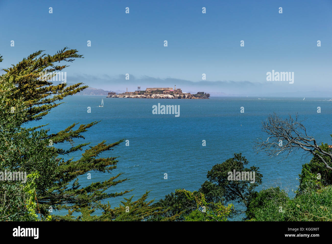 The prison and island of Alcatraz in San Francisco Bay on a rare fog free day Stock Photo