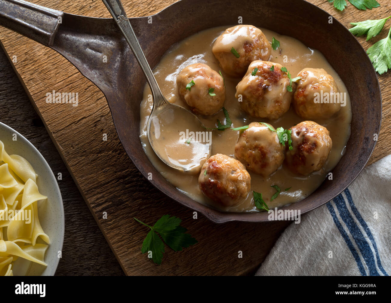 Delicious homemade swedish meatballs with mushroom cream sauce and egg noodle. Stock Photo