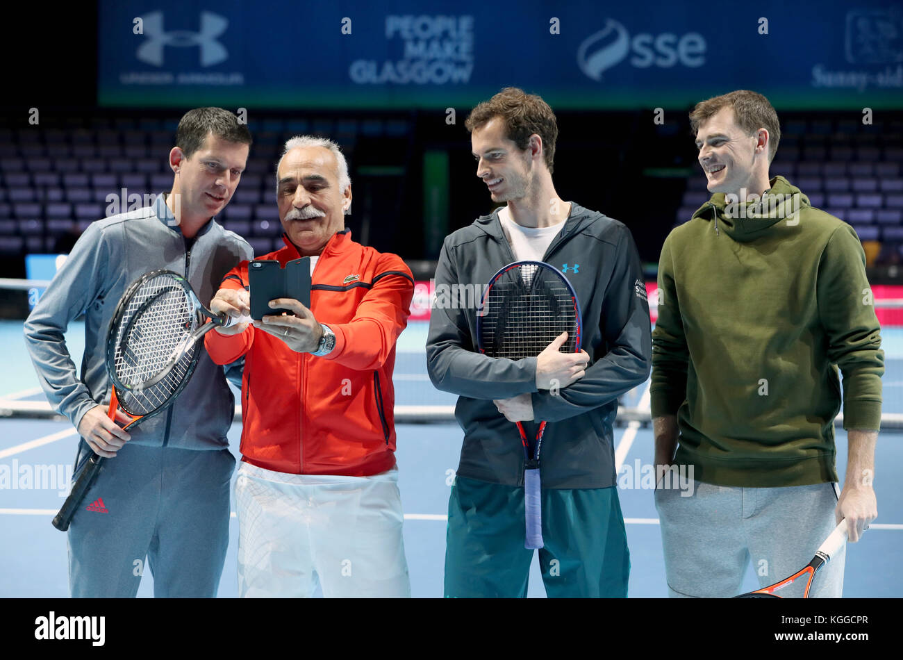 from left) Tim Henman, Mansour Bahrami, Andy Murray and Jamie Murray on court ahead of the Andy Murray Live Event at the SSE Hydro, Glasgow Stock Photo