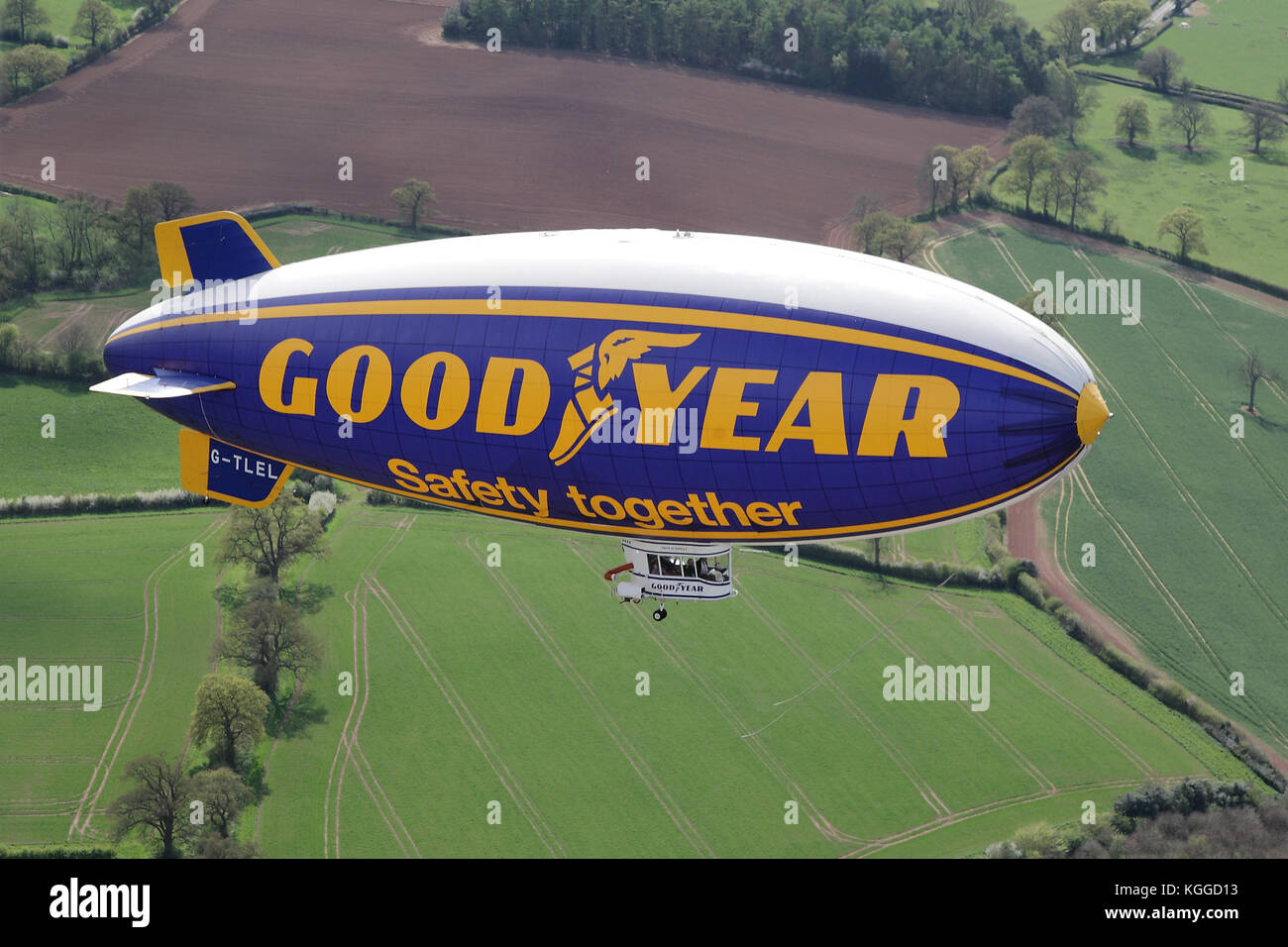 Air to air in flight Goodyear dirigible blimp / airship G-TLEL Spirit of Safety airborne flying over Shropshire countryside from Halfpenny Green. Stock Photo