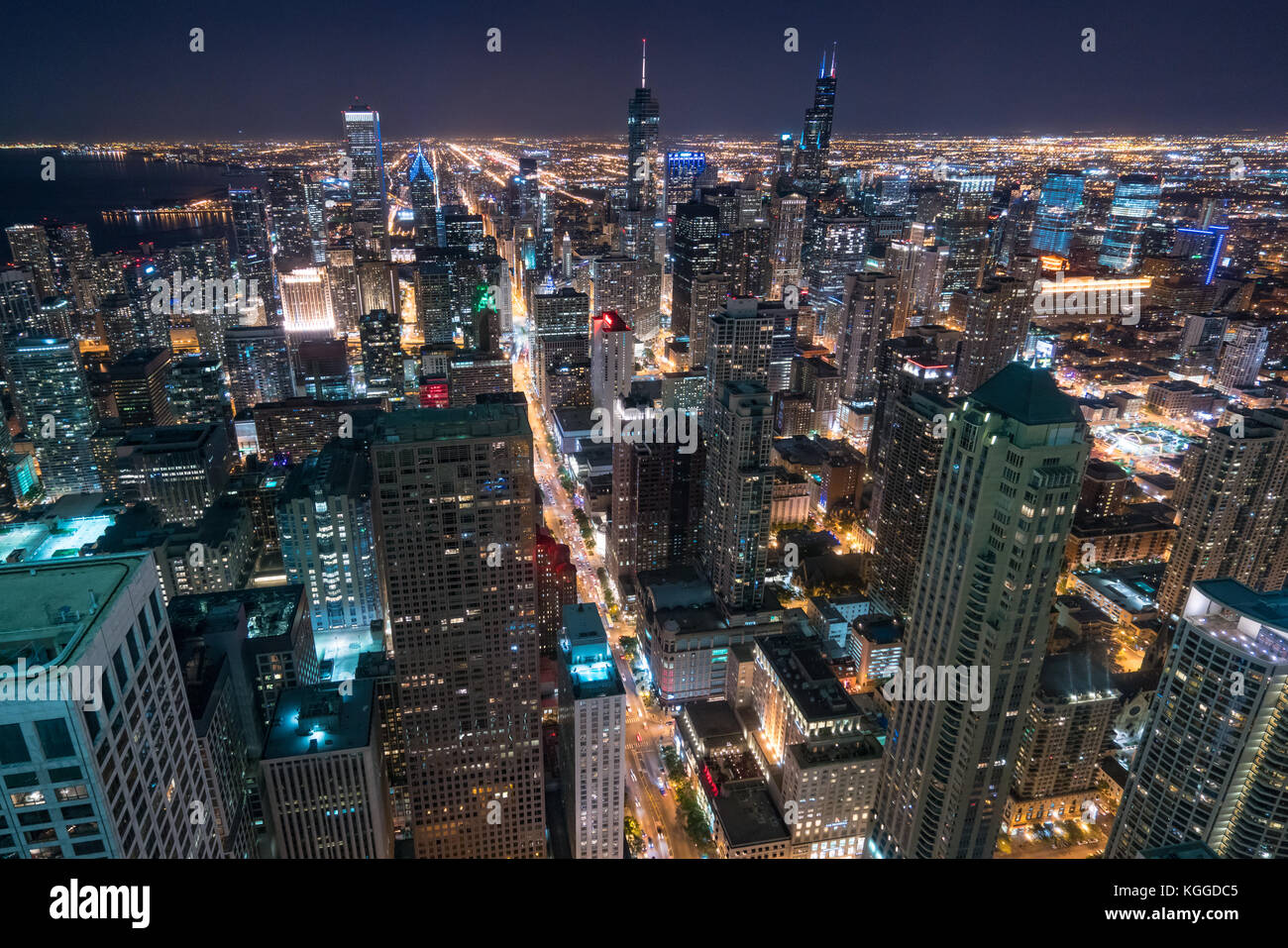 Aerial view Chicago Night Skyline looking south along Lake Michigan Stock Photo
