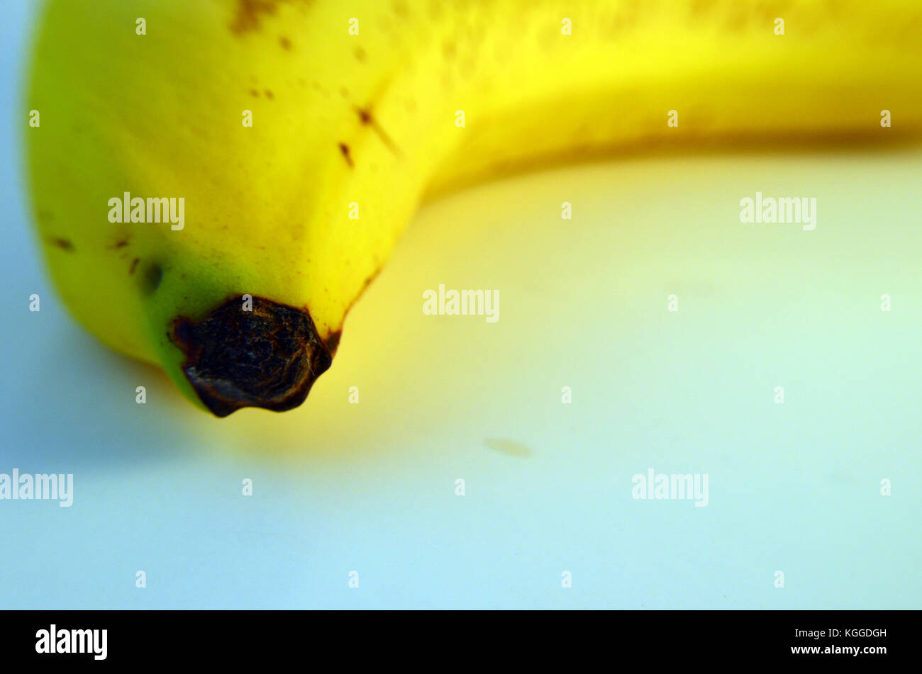 The dark end of a banana peel Stock Photo Alamy