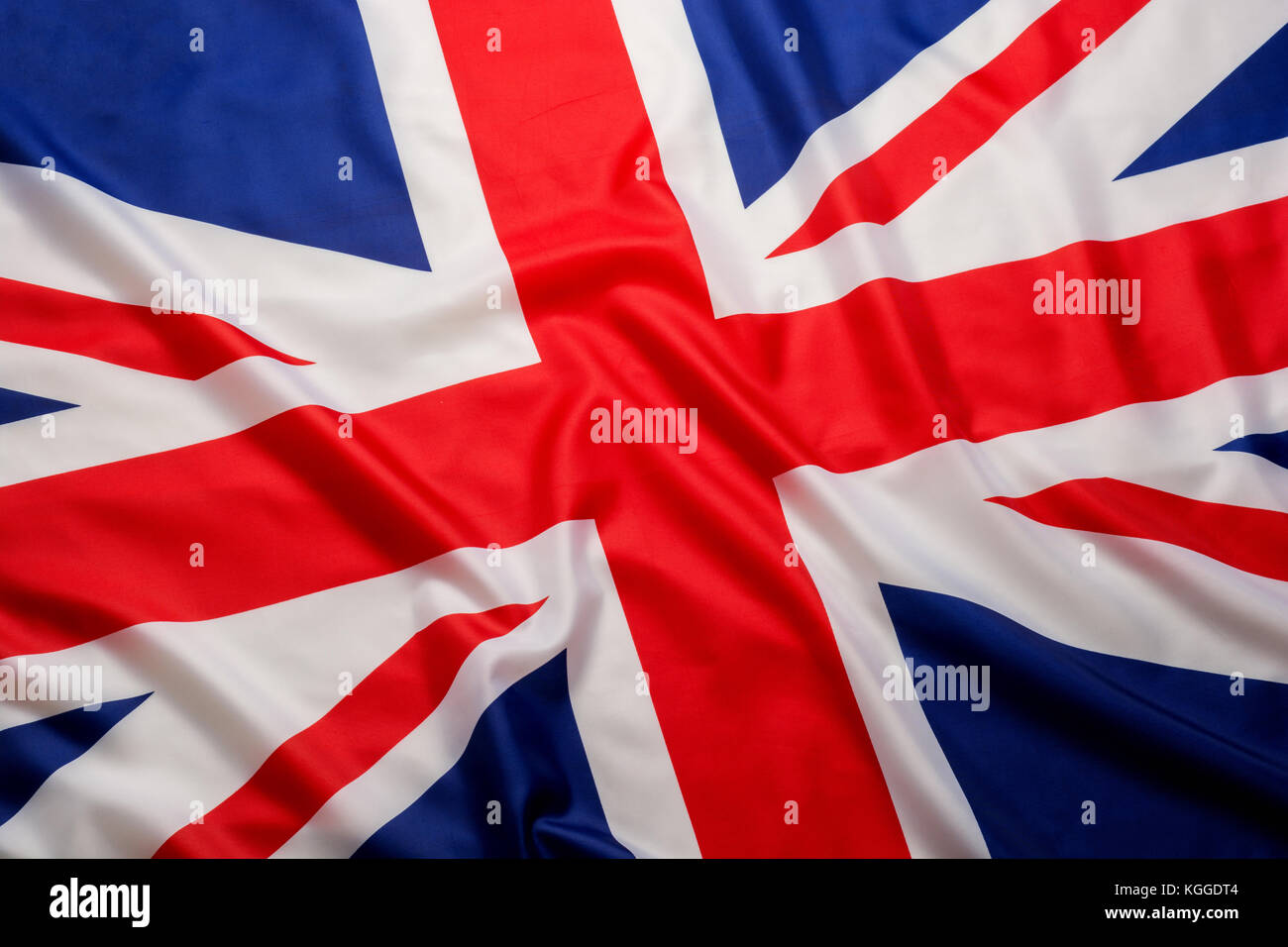 Closeup beautifully wavingof UK British flag Union Jack flag background Stock Photo