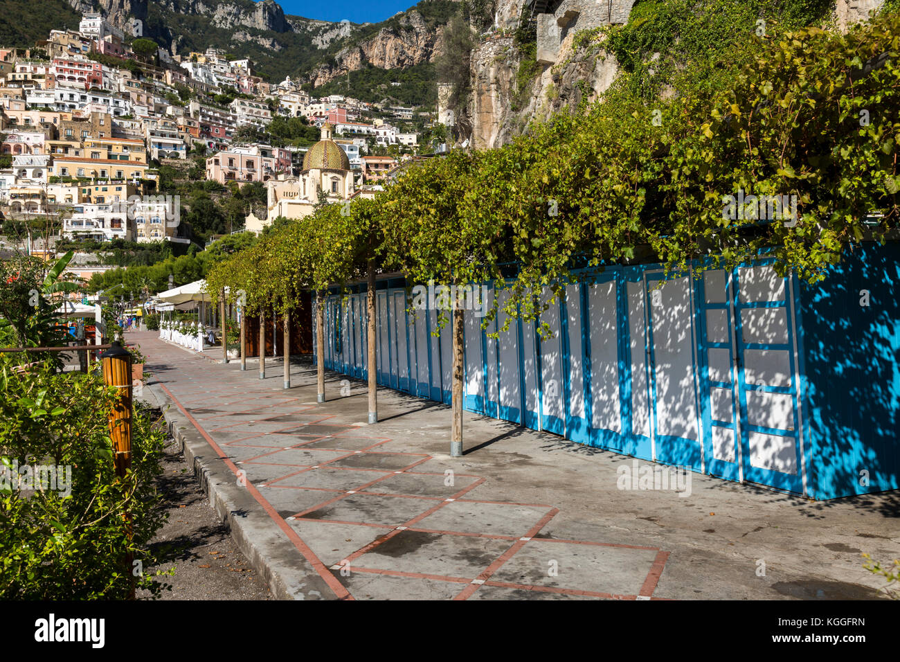 Blue and white beach changing rooms lined up on Spiaggia Grande beach in Positano, Italy. Stock Photo