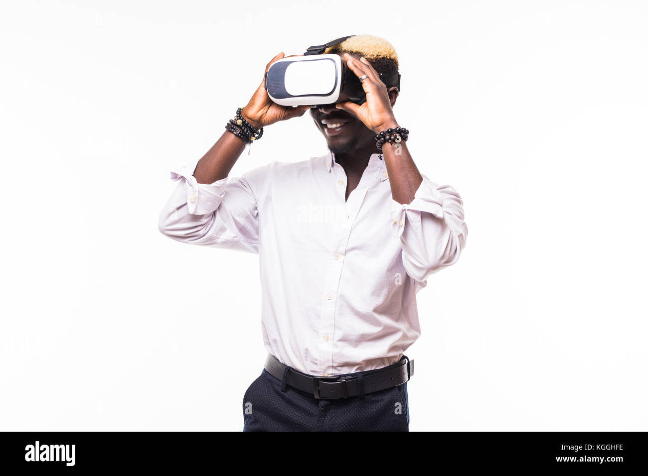 African American young man wearing vr virtual reality headset over ...