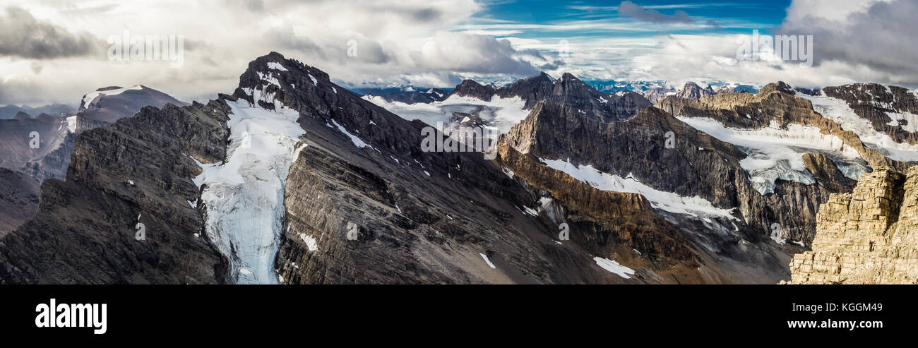 Wild Mountain Scene with Clouds, Sky and Climber Stock Photo