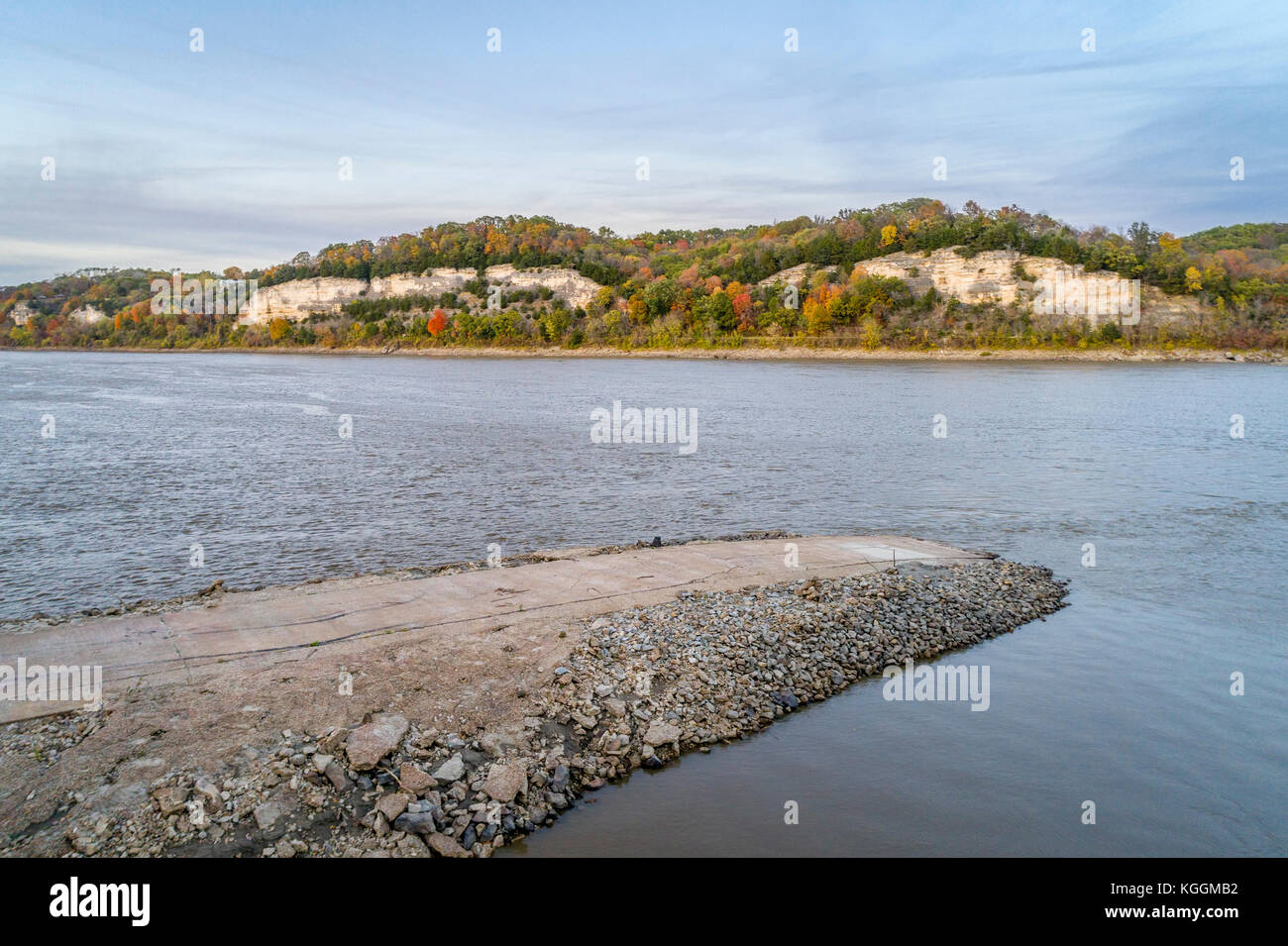 Missouri River near Rocheport, MO (Taylor's Landing), old boat ramp and Katy Trail under high cliff - aerial view in late October evening Stock Photo