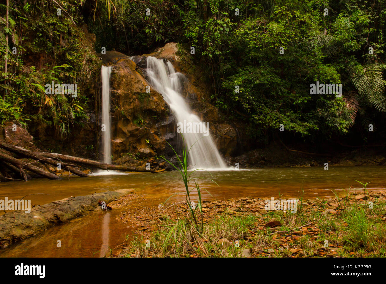 Small waterfall in rainforest. Inland of Sarawak, Borneo. Stock Photo