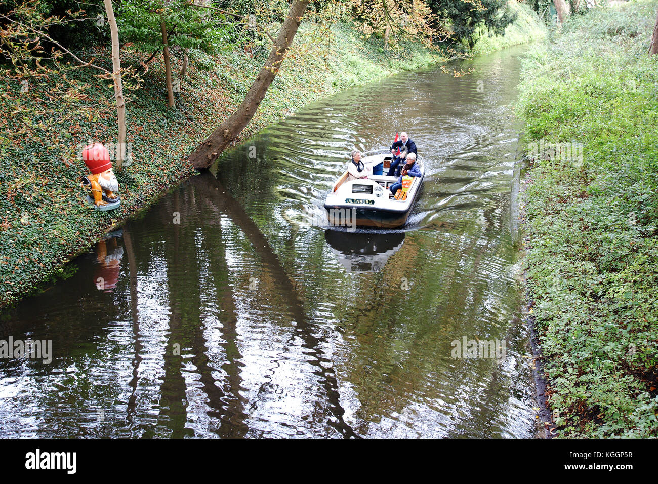 electric trip boat passes one of the many fantastical Hieronymous Bosch