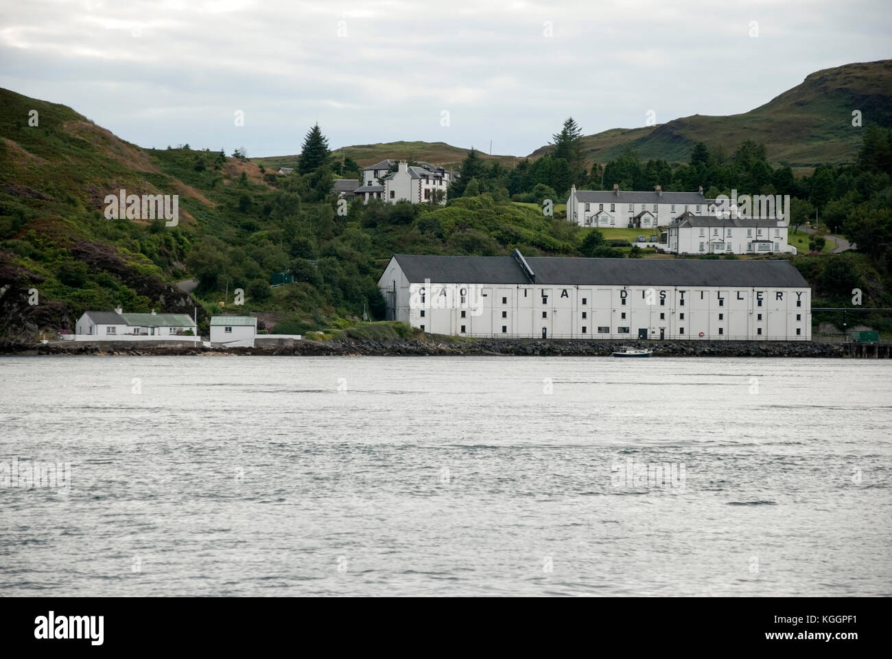 The Caol Ila Scotch Whisky Distillery Complex Port Askaig Isle of Islay Scotland United Kingdom seascape view from Sound of Islay of 1846 Diageo owned Stock Photo