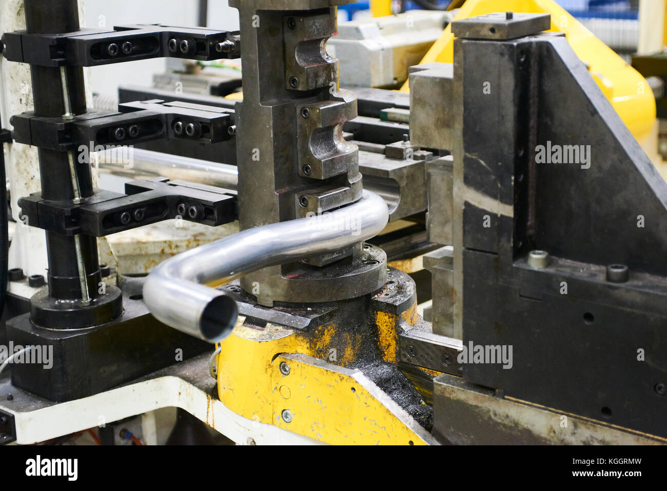 Robot bending pipe in modern factory Stock Photo