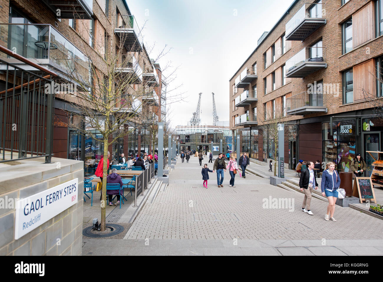 Shoppers on Gaol Ferry Steps at Wapping Wharf in Bristol Harbour UK